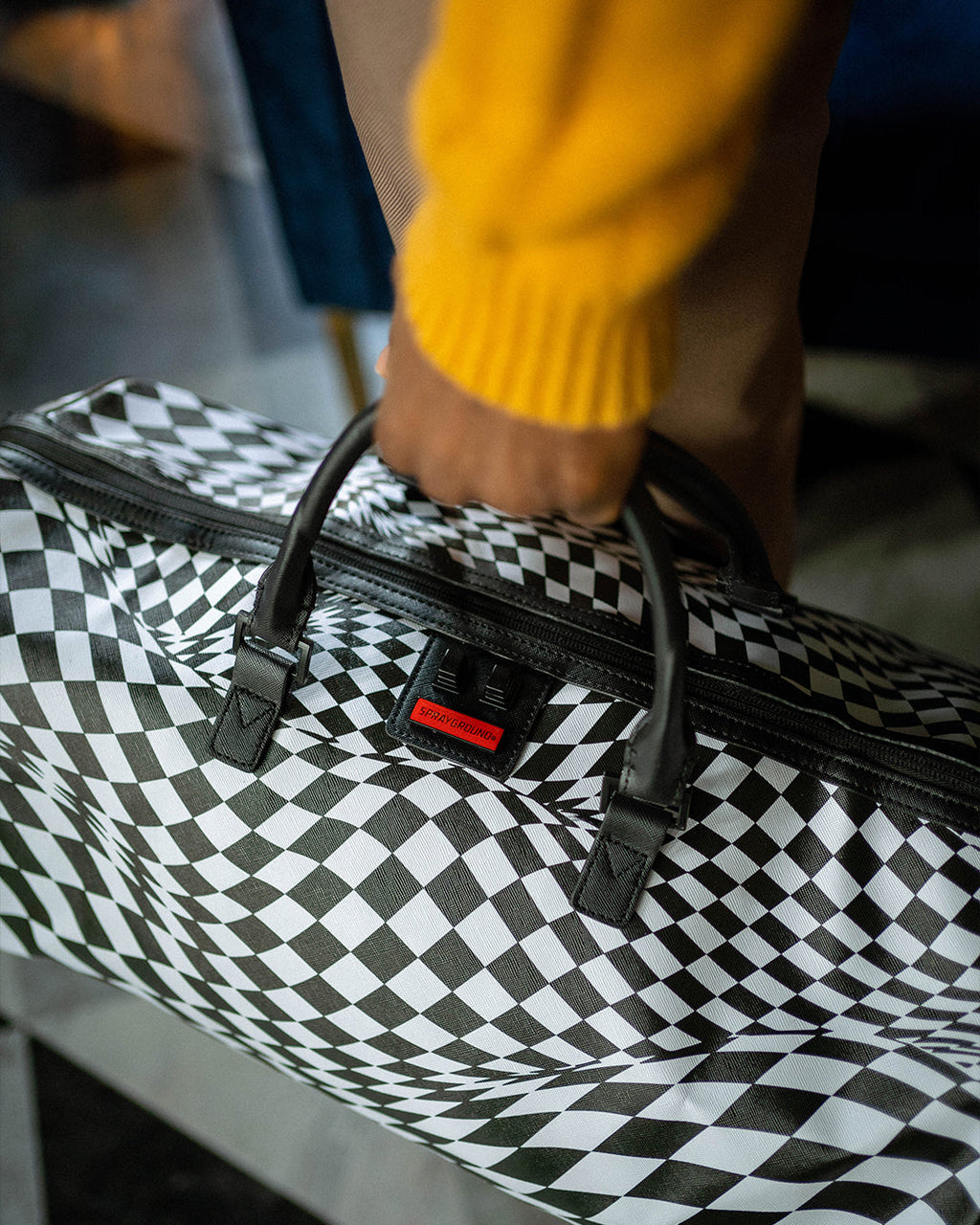 TRIPPY CHECK DUFFLE
